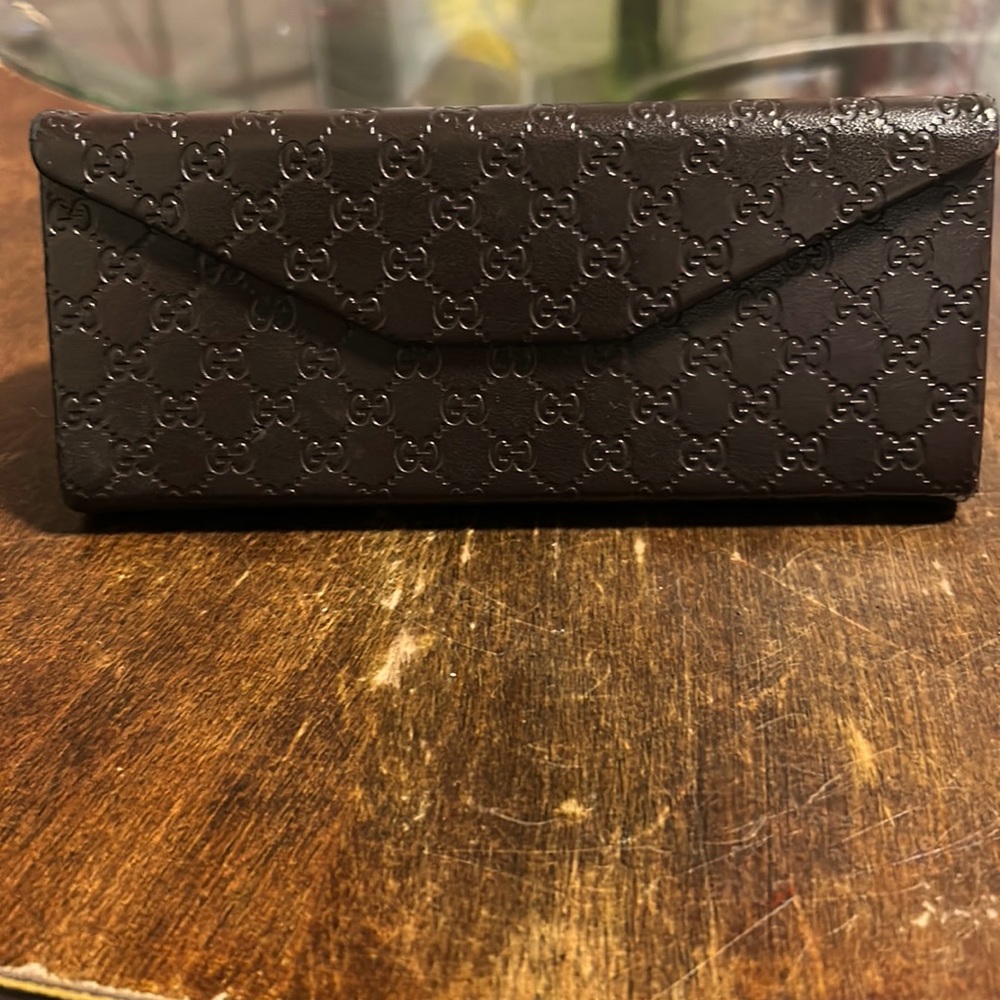 Gucci glasses case…